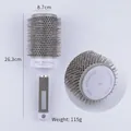 Dettaglio della spazzola rotonda in ceramica da 65mm con cilindro termico e impugnatura - Misura 65# (8.7cm Diametro)