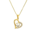 Collana con ciondolo a cuore dorato con perla e zirconi su una catena sottile - Perla