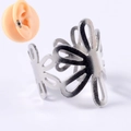 Silver flower ear cuff in hollowed floral design with polished mirror finish - Orchid Pattern