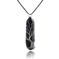 Macro shot of silver wire handmade tree of life wrapping on black stone pillar pendant - Wire Wrapped Black Agate + Leather Cord