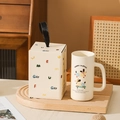 Cream ceramic puppy mug with matching gift box on a wooden wavy tray display - Headscarf