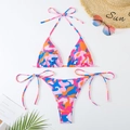Vibrant two-piece halter bikini with pink camouflage print and adjustable side-tie bottoms - S / Rose Red