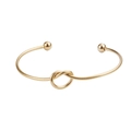 Bracelet jonc ouvert en or mat avec nœud de cœur et extrémités sphériques lisses - Coeur Noeud / Or