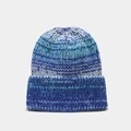 Detail of blue and white tie-dye knit beanie showing thick texture and folded cuff - Blue