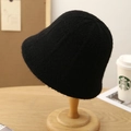 Women's warm black plush knit bucket hat with textured finish on a wooden stand - M(56-58cm) / Black