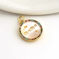 Macro detail of gold-plated Mama pendant with colorful zircons and white mother of pearl - MAMA Letter Mother of Pearl (02)