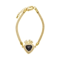 Elegante pulsera de malla bañada en oro con un colgante de corazón negro y diamantes - Negro