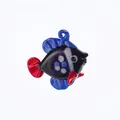 Close-up of handmade glass fish figurine for aquarium with vibrant blue fins and red tail - Style 17-Black Blue Red White Patchwork Fish