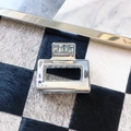 Detail of square silver metal hair claw clip displayed on a checkered background texture - Square Hollow Style (7)