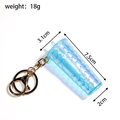Miniature blue iridescent tumbler keychain with dimensions 7.5cm by 3.1cm details - Blue Dragon Scale Cup (Gold Clasp)