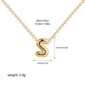 Macro shot of 3D bubble letter S pendant with dimensions and polished gold finish - Letter S