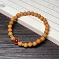 Bamboo-style sandalwood bracelet with a red agate bead and sparkling silver spacers - Sandalwood 6mm with Agate Bead