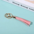 Pink PU leather tassel keychain with gold metal ring and lobster clasp detail - Hot Pink
