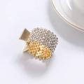 Elegant gold alloy ponytail clip with pavé rhinestones in a circular fashion design - Gold