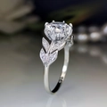 Elegant floral crown ring with leaf designs and a round-cut zircon in silver setting - US 8 / Silver