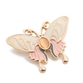 Golden butterfly brooch with pink enamel wings and orange cat eye stone center - Style 12/Cat Eye Stone Decor