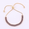 Adjustable gold tennis bracelet with purple rectangular-cut cubic zirconia crystals - Slider Clasp Gold-Purple