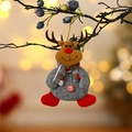 Christmas reindeer ornament in grey burlap with red scarf hanging on a festive branch - Button Reindeer