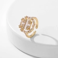 Close-up of golden octagonal open ring with clear cubic zirconia stones on white background - Style 2 / Gold