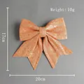 Fiocco natalizio oro arancio da 20 cm con glitter e paillettes per decorazioni festive - Arancione