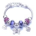 Silver bead bracelet with purple charms featuring crown, butterfly and rose motifs - Purple