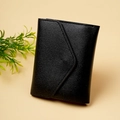 Detailed close-up of a black litchi pattern leather wallet with minimalist triangle flap - Black