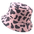Pink and black cow print bucket hat with a reversible streetwear style design - 58cm / Pink Cow Print