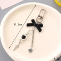 Black ribbon bow keychain with star and heart charms, 11.5cm length and 8.2g weight - Small Pendant / Black Bowknot with Heart Charm(K4872)