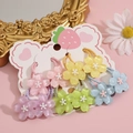 Set of 10 colorful flower hair ties for girls on strawberry card display closeup - 10 Pieces Set (5 Pairs)
