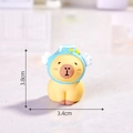 Mini resin capybara figurine with blue hat and stars, measuring 3.8cm by 3.4cm - Aquarius - Capybara