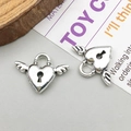 Antique silver alloy heart wing pendant clasp with intricate vintage carving details - Antique Silver Heart Wing Lock Charm
