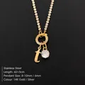 Gold plated stainless steel initial 't' necklace with sparkling cubic zirconia - Letter T