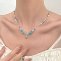 Bohemian summer necklace featuring a silver starfish charm and blue turquoise stones - Starfish Necklace (12355)