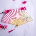 Elegant bamboo folding fan with pink gradient cherry blossom pattern and silk tassel - Pink and Yellow Gradient Cherry Blossom Style (Women's Fan-32)
