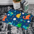 Quilted blue pet sleeping mat with cartoon dinosaur pattern for dogs and cats - Dinosaur Paradise