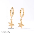 Pendientes de estrella de mar en acabado dorado con medidas detalladas del producto - Dorado