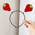 Cute strawberry headband with red fruit charms and flexible springs on a black band - Strawberry Spring Hairband