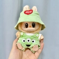 Labubu plush doll wearing green corduroy overalls with Alien pattern and a bucket hat - Three-eyed Jumpsuit / First And Second Generation Keychains Are Compatible With La Cloth Dolls. Dolls Not Included.