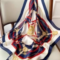 Navy blue silk-satin scarf with golden horse bit and nautical chain print on wooden chair - Chain-link Navy Blue Handkerchief / 65