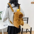 Cute Capybara brown plush backpack with orange detail shown on a model for daily use - Persimmon Style (Plush Strap)
