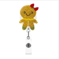 Christmas Gingerbread Girl badge reel with gold glitter finish and red bow detail - Gingerbread Man