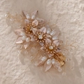 Close-up of handmade gold flower hair clip with vintage crystals and pearls for weddings - Gold HS-J6985G