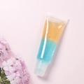Close-up of double-layered yellow and blue gel lip gloss in a tube on pink floral background - No.02 / 10ml Bottle Unpackaged (excluding Cardboard Box)
