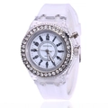 Luminous LED quartz watch with white silicone strap and rhinestone-set clear plastic case - White