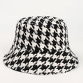 Close-up of thick houndstooth pattern fabric on a stylish winter bucket hat for women - M (56-58cm) / Large Houndstooth - Black and White