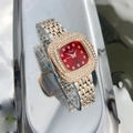 Detail view of the red square dial and diamond-set bezel on the dual-tone link watch - Two-tone Red Face