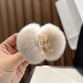 Plush faux rabbit fur hair claw clip in beige featuring two soft decorative pom-poms - Light Coffee