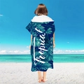 Microfiber hooded beach towel with dark blue tropical palm leaf print and DREAM text - Pullover Style - Tropical Leaves
