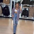 Mirror selfie showing a grey plaid shirt with white crop top and ripped wide-leg jeans - S / Pink