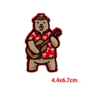 Embroidered patch featuring a cute brown bear playing ukulele in a red Hawaii shirt - Bear Playing Guitar